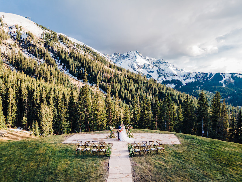Bride and groom getting married at Bon Vivant restaurant at Telluride Ski Resort