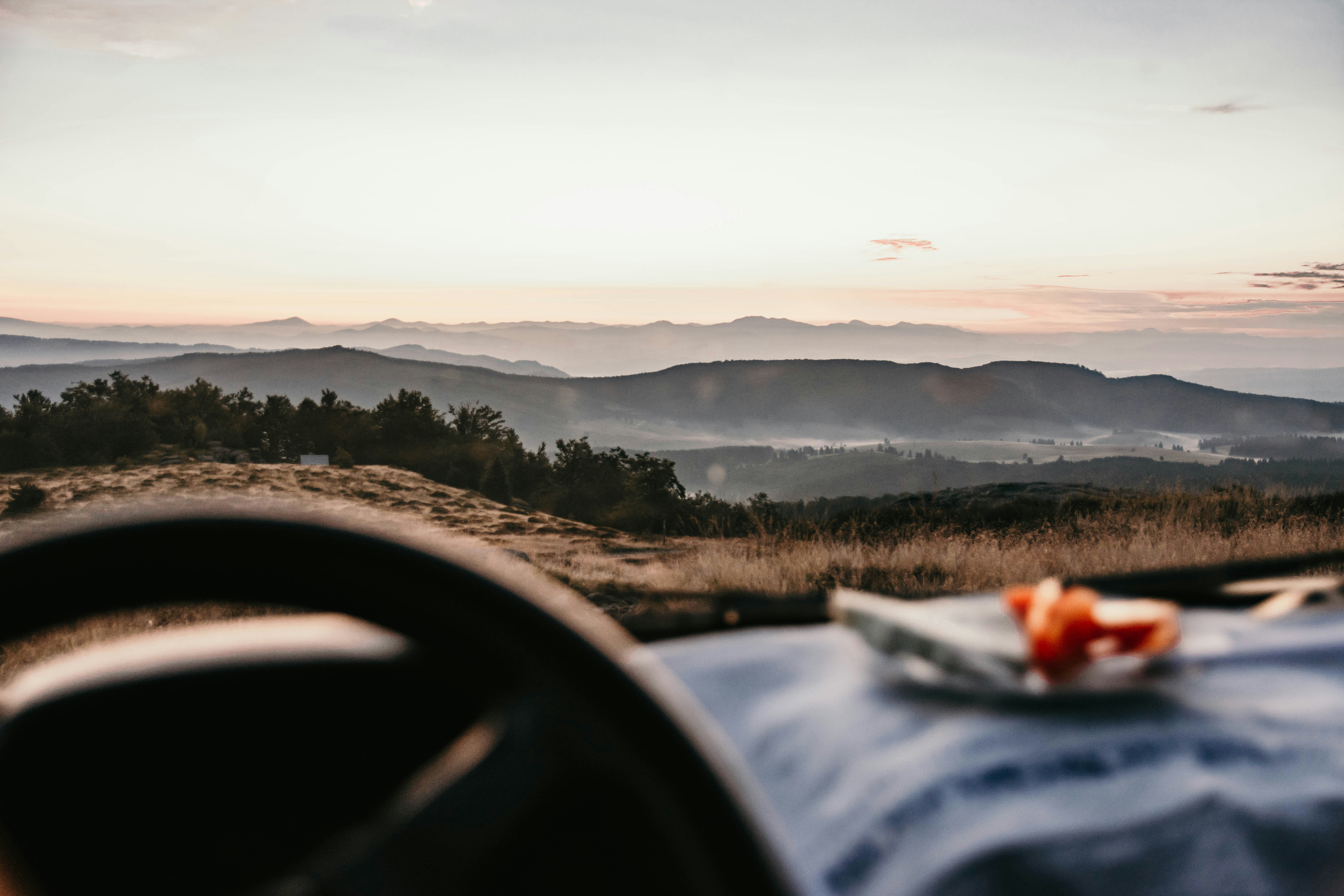 outside dinner table overlooking mountain landscape