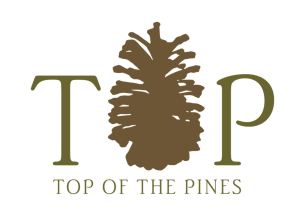 top of the pines logo with pine cone