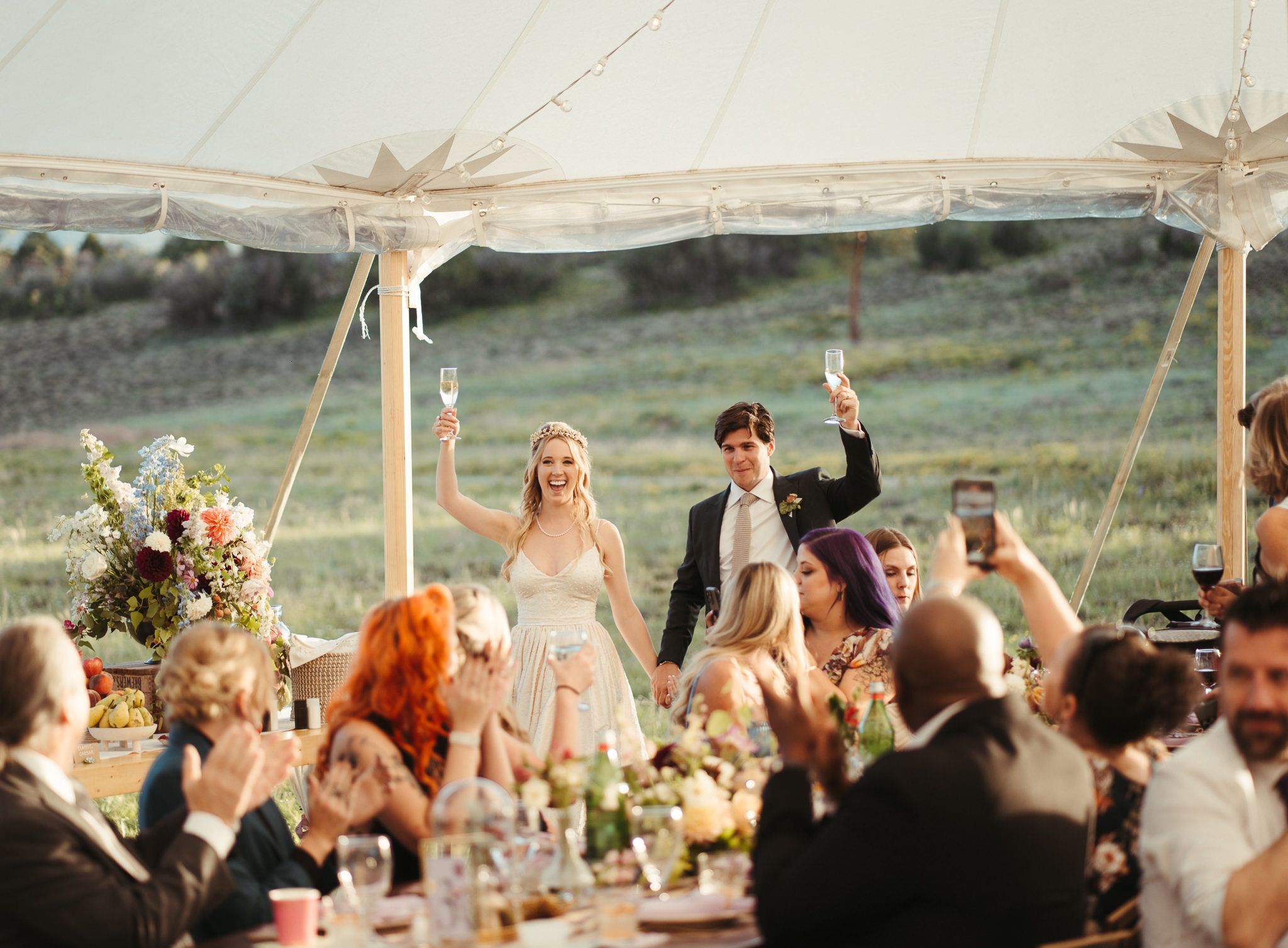 Couple toasting at wedding reception